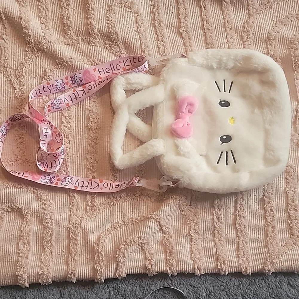 Hello Kitty Handbag with adjustable shoulder strap. White with pink bow. NWOT